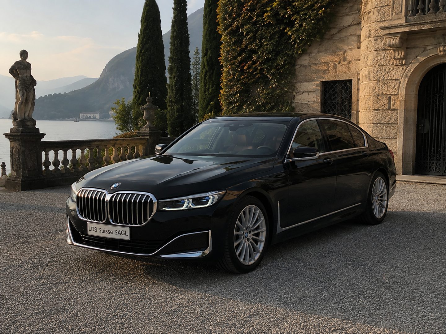 BMW 7 Series at the entrance of a villa